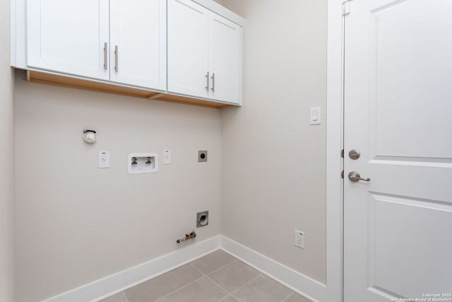 laundry room featuring light tile patterned floors, hookup for a washing machine, cabinets, hookup for a gas dryer, and hookup for an electric dryer