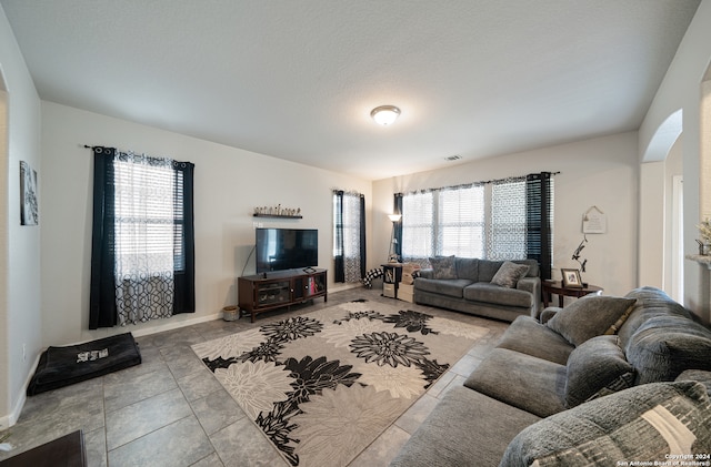 living room featuring tile flooring