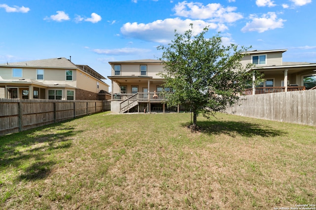 view of yard with a deck