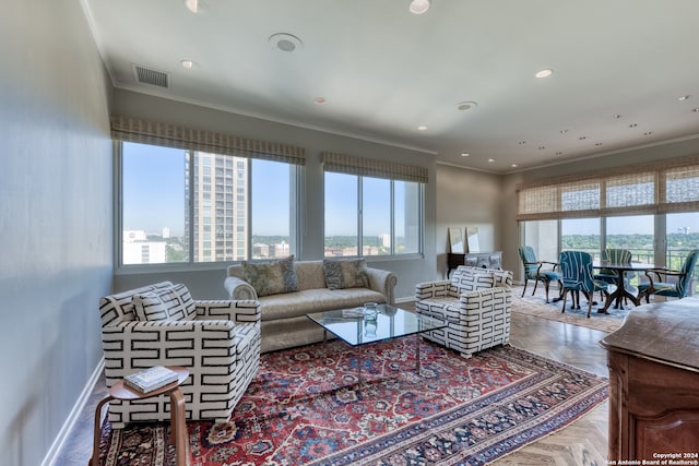 living room featuring parquet floors and ornamental molding