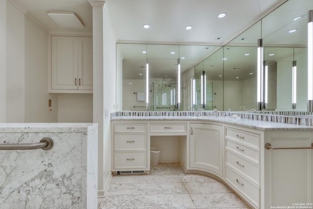 bathroom featuring recessed lighting, vanity, and a walk in shower