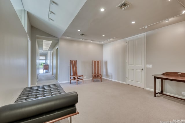 living area with visible vents, light carpet, recessed lighting, rail lighting, and baseboards