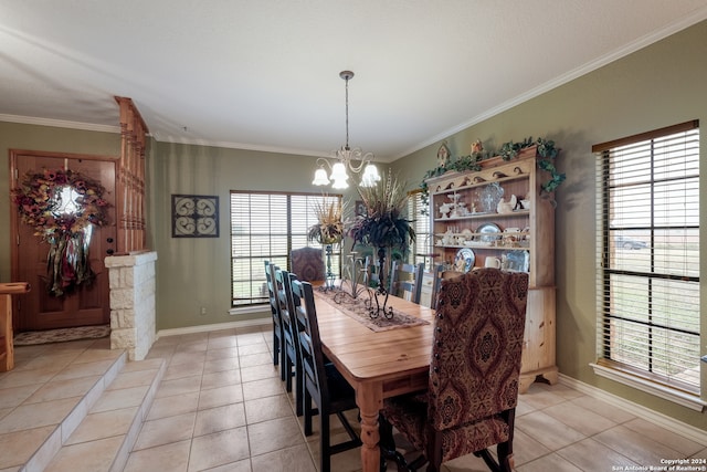 tiled dining area with a notable chandelier and crown molding