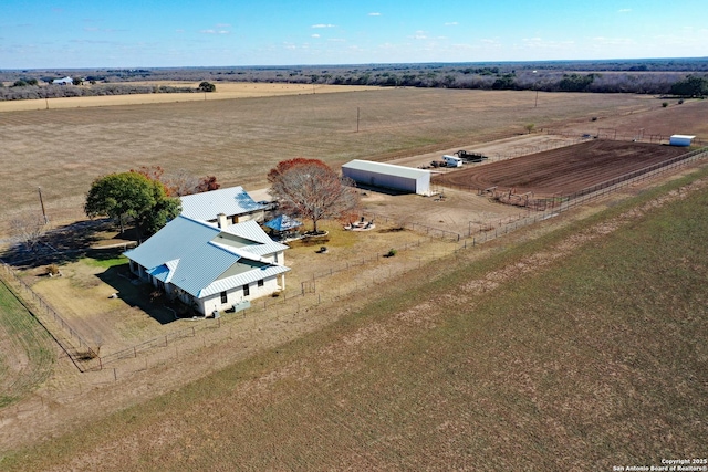 birds eye view of property featuring a rural view