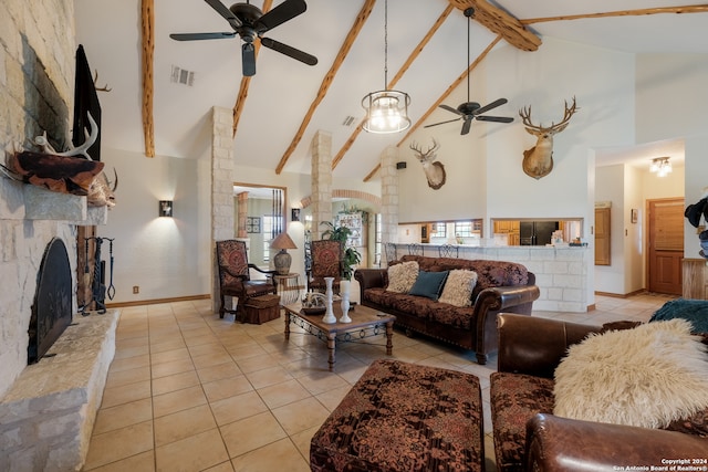 tiled living room featuring beam ceiling, high vaulted ceiling, a fireplace, and ceiling fan