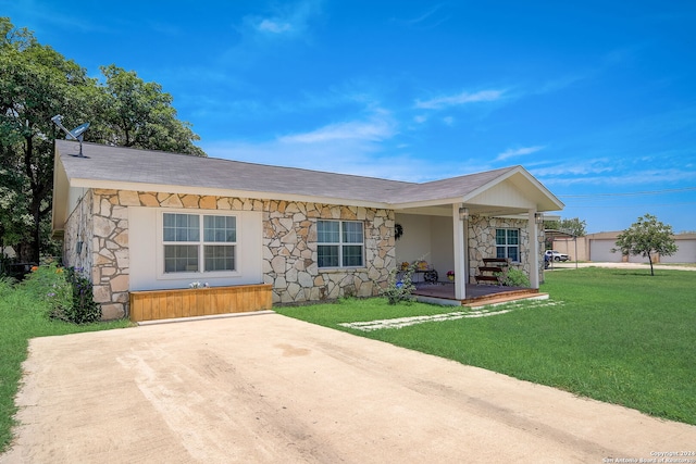 ranch-style house with a front lawn