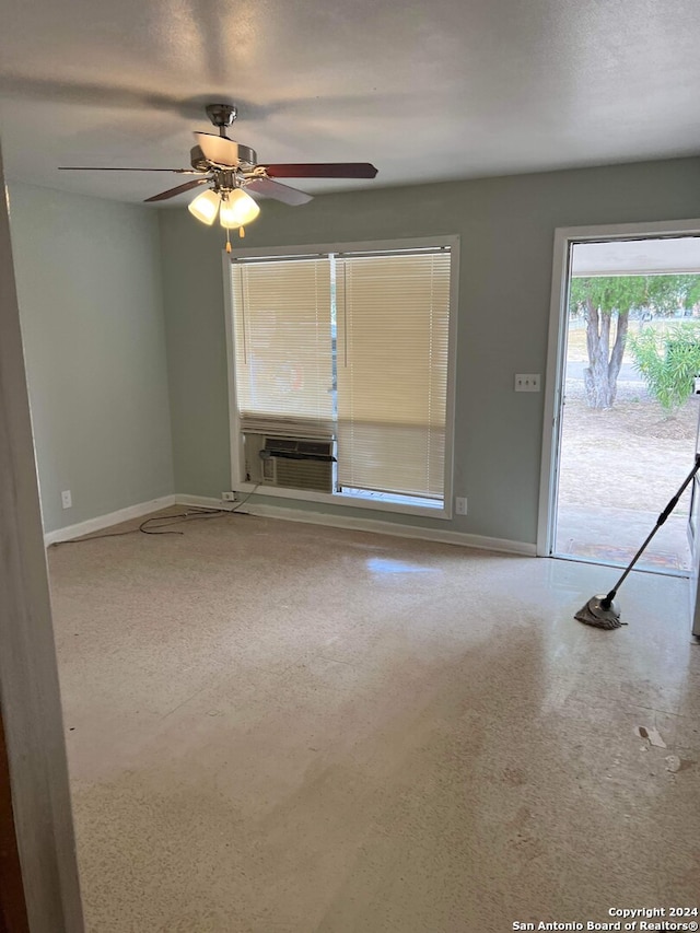 empty room featuring ceiling fan