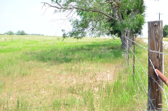 exterior space with a rural view