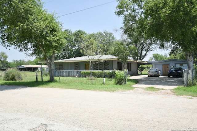 view of front of home featuring a garage and a front yard