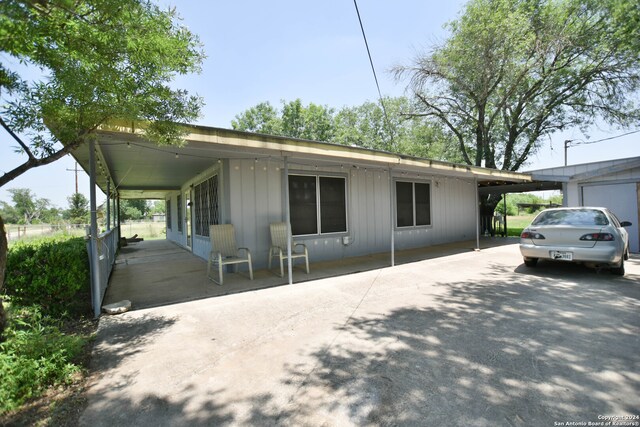 view of front of home featuring a carport