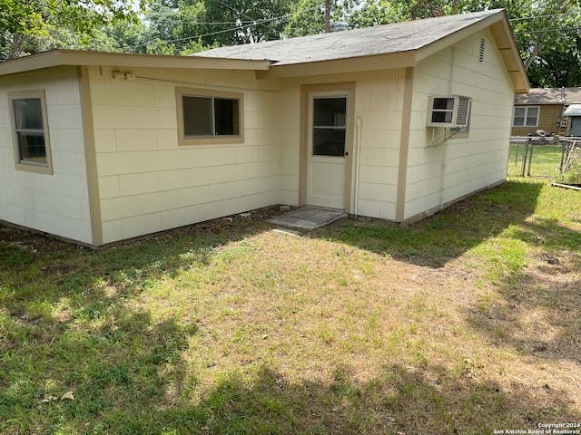 view of outbuilding featuring a yard