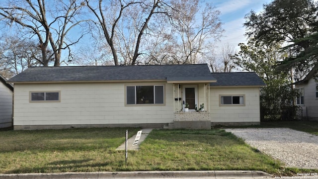 ranch-style house with a front yard