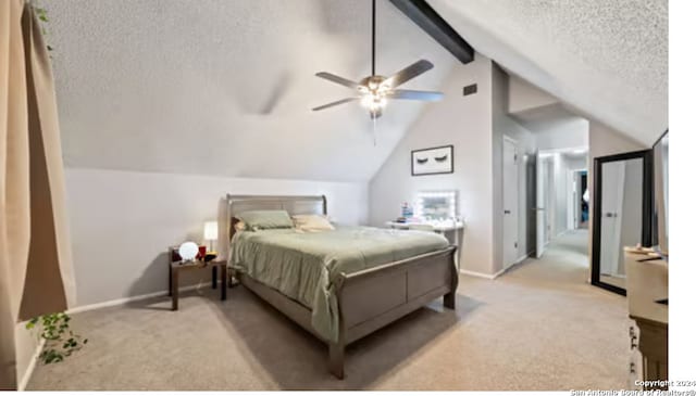 bedroom featuring light colored carpet, lofted ceiling with beams, ceiling fan, and a textured ceiling