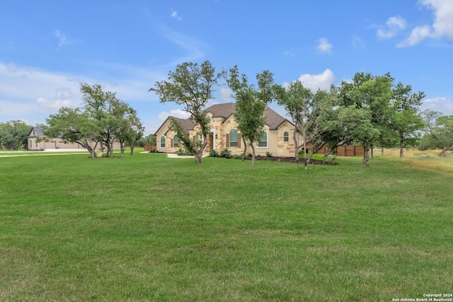 view of front of house with a front lawn