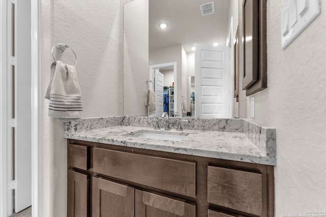 bathroom featuring large vanity