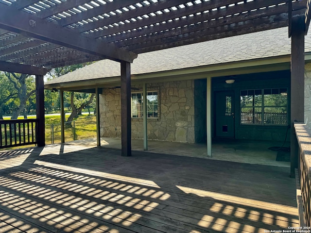 wooden deck featuring a pergola