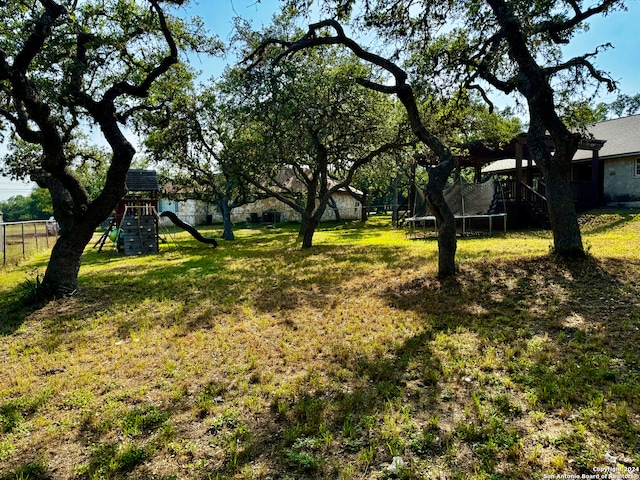 view of yard with a playground