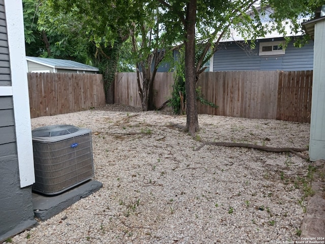 view of yard featuring central AC