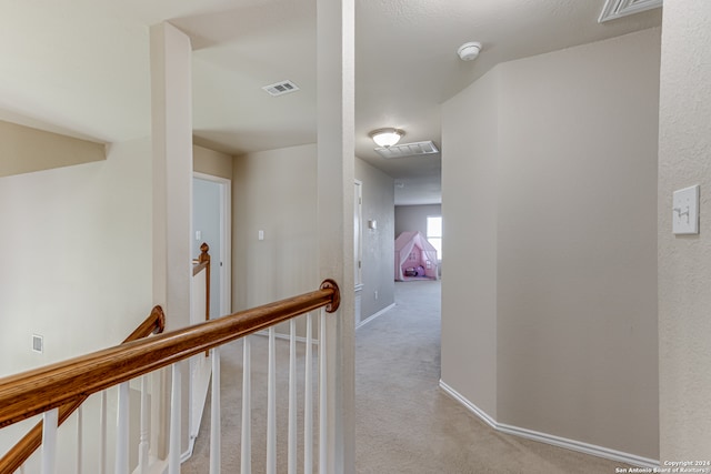 corridor featuring carpet flooring