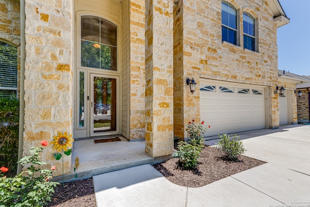 property entrance featuring a garage