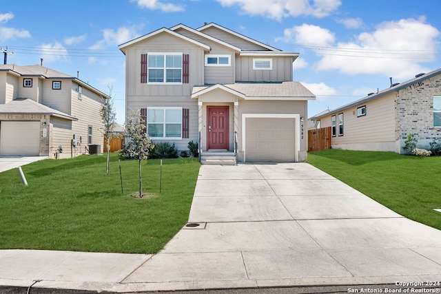 view of front of property with a garage and a front yard