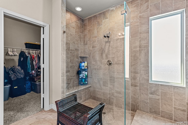 bathroom with tiled shower