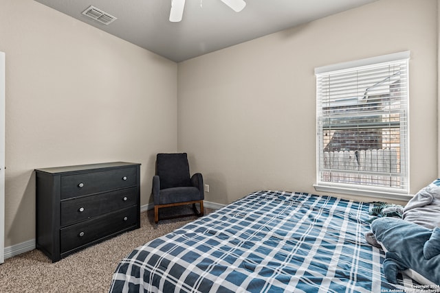 bedroom with light carpet and ceiling fan