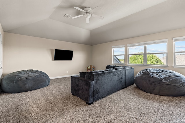 carpeted living room with lofted ceiling and ceiling fan