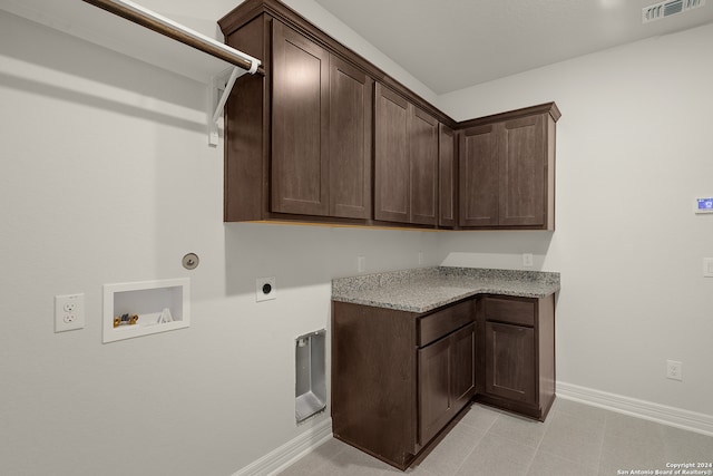 laundry room with washer hookup, cabinets, and hookup for an electric dryer