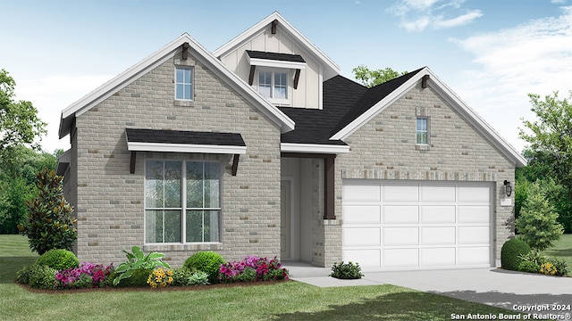 view of front of house featuring a garage and a front lawn