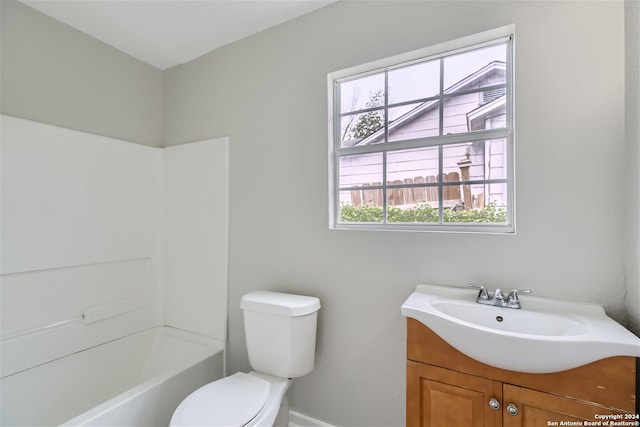 full bathroom with shower / washtub combination, toilet, and vanity