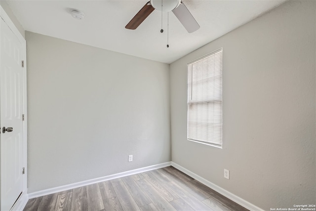 unfurnished room featuring wood-type flooring and ceiling fan