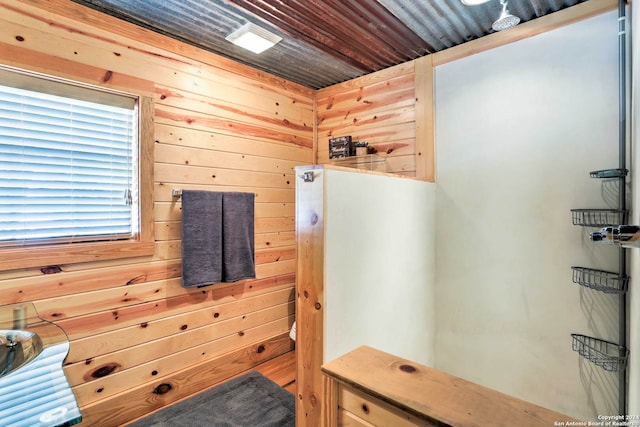 bathroom with wood ceiling