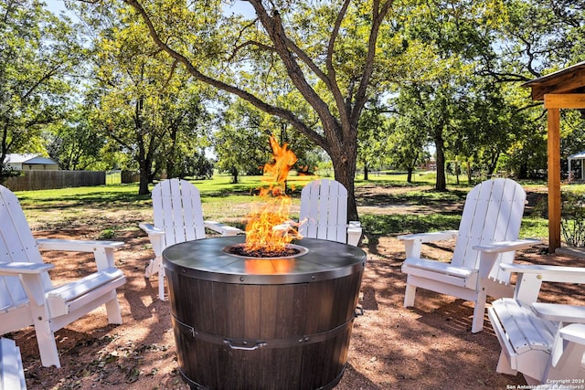 view of patio featuring an outdoor fire pit