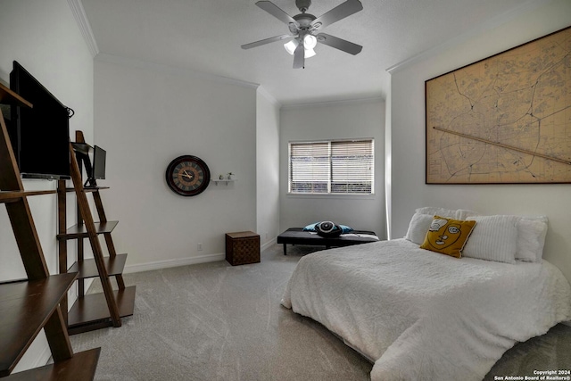 bedroom featuring crown molding, carpet, and ceiling fan