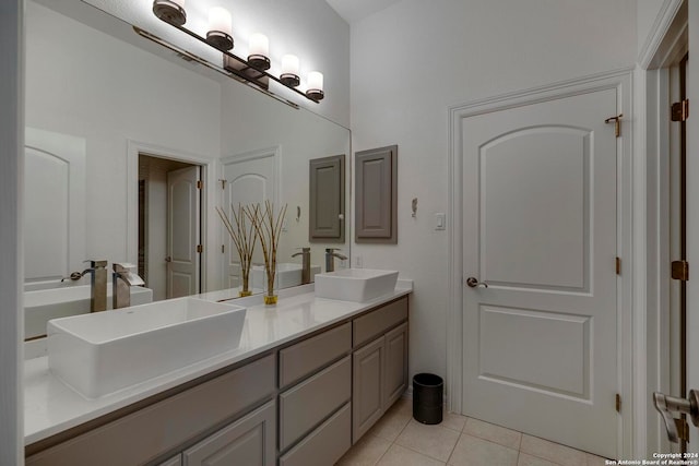 bathroom with vanity and tile patterned flooring