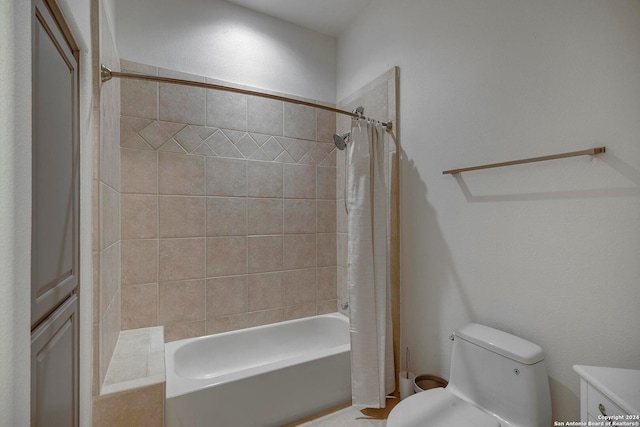 full bathroom with vanity, toilet, and shower / bath combo with shower curtain