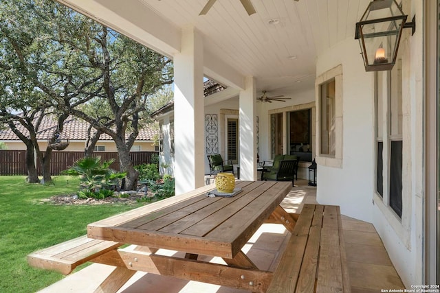 view of patio featuring ceiling fan