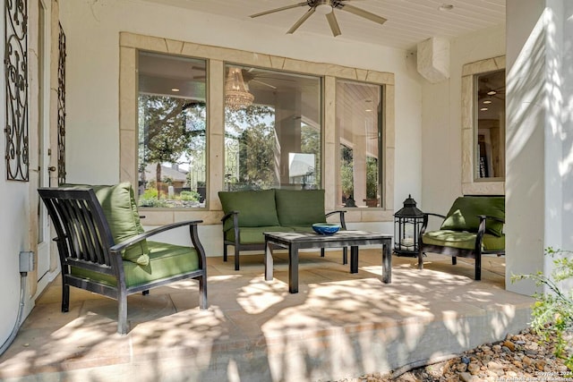 exterior space with an outdoor living space and ceiling fan