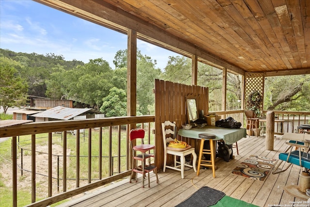 sunroom / solarium with wooden ceiling