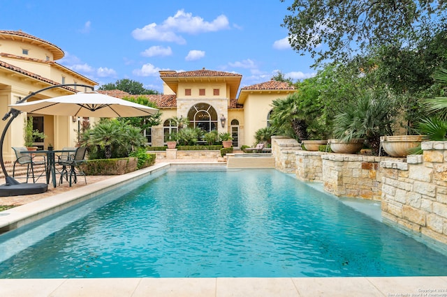 view of pool featuring a patio area