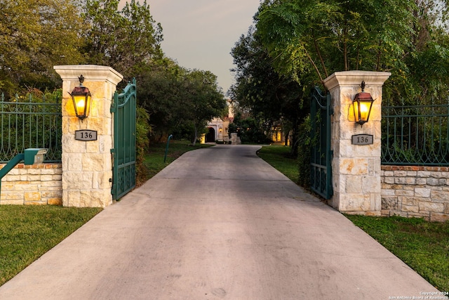 136 S Tower Hl, Country Village, TX 78232 - view of concrete driveway featuring a gated entry and a gate