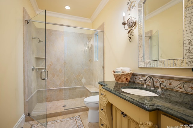 bathroom with vanity, tile patterned flooring, toilet, ornamental molding, and an enclosed shower