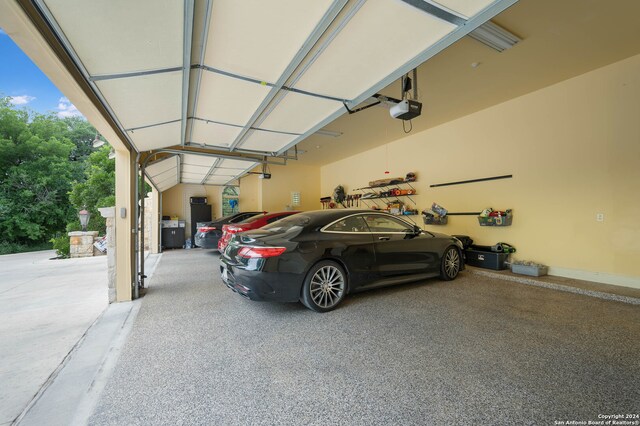 garage featuring a garage door opener