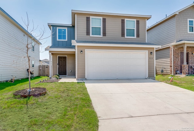 view of front property with a front lawn and a garage