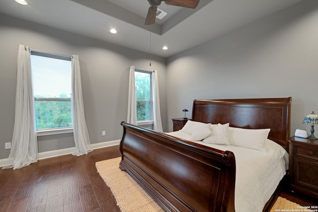 bedroom featuring dark wood-type flooring and ceiling fan