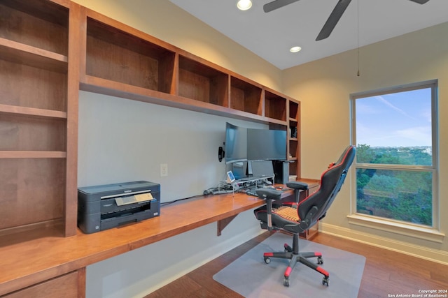 office space with dark hardwood / wood-style floors and ceiling fan