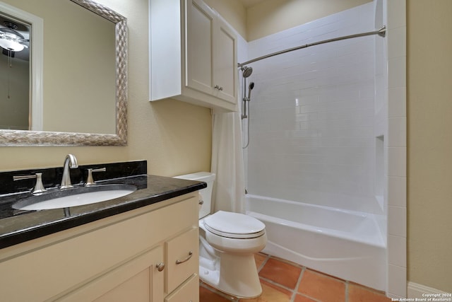 full bathroom with tile floors, shower / bathing tub combination, oversized vanity, and toilet