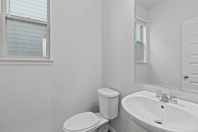 bathroom featuring sink and toilet