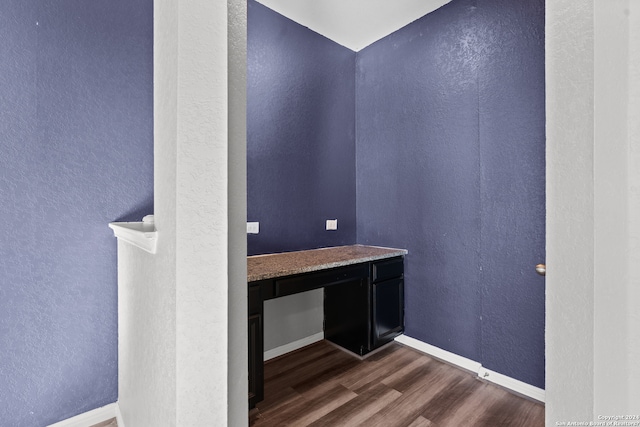 bathroom with hardwood / wood-style flooring